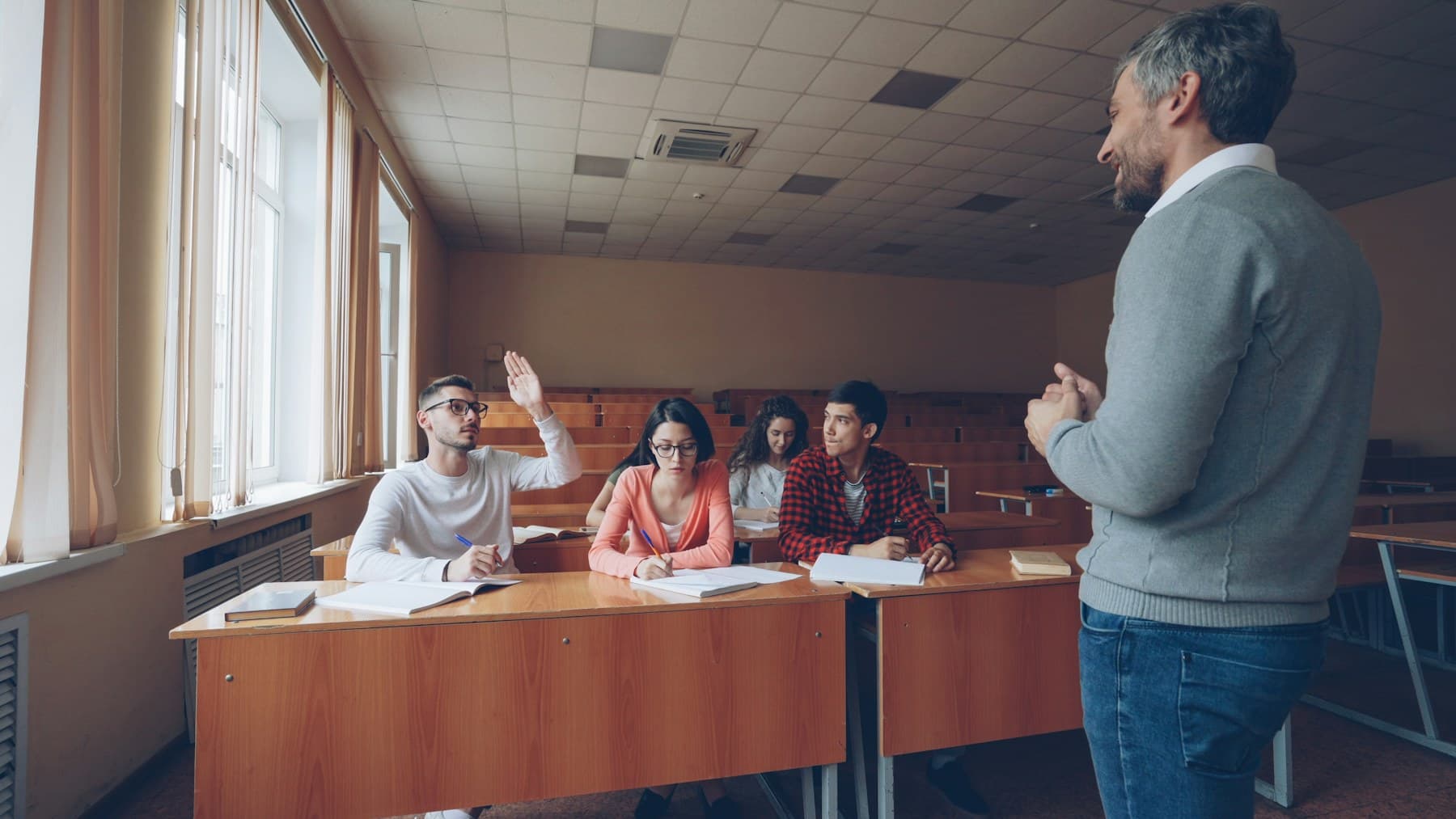 Teacher leading a classroom discussion